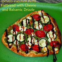 Tomato-Zucchini Pesto Flatbread with Chevre and Balsamic Drizzle...Featuring NatureSweet Cherub Tomatoes Tomato-Zucchini Pesto Flatbread with Chevre and Balsamic Drizzle...Featuring NatureSweet Cherub Tomatoes