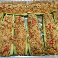 Zucchini Boats stuffed w/ Sausage and Cous-Cous